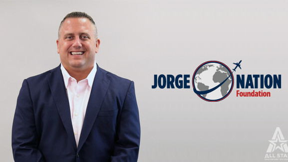 Keith Shattuck with the Jorge Nation Foundation logo