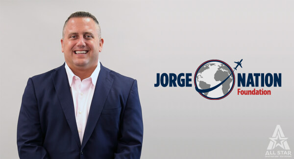 Keith Shattuck with the Jorge Nation Foundation logo