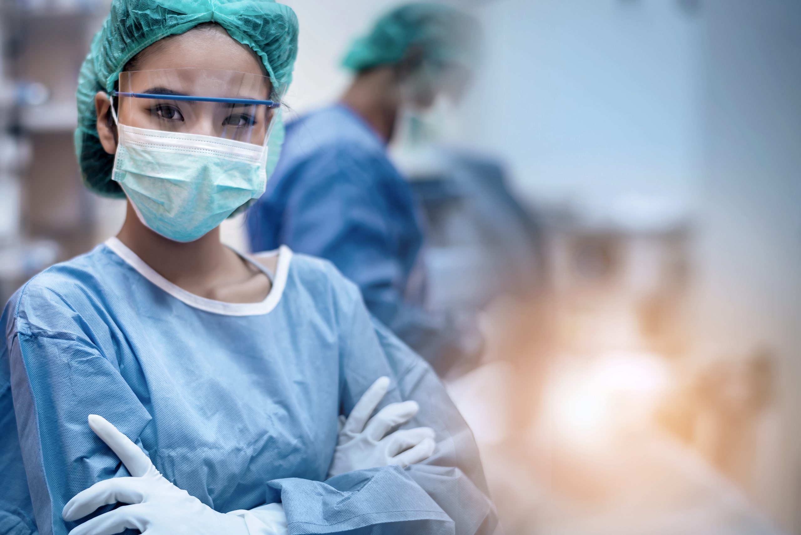 Doctor wearing mask in operating room