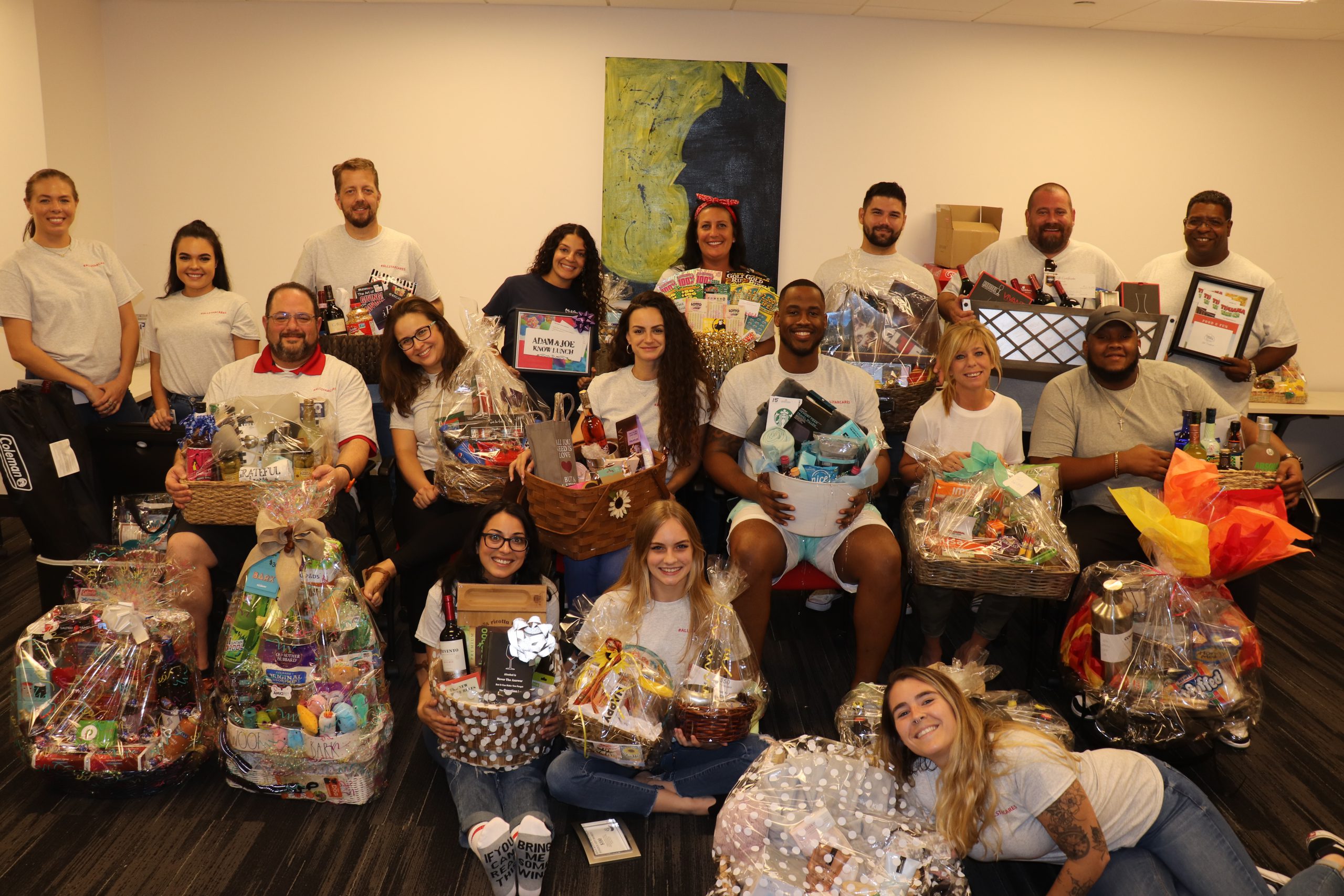 People holding gift baskets